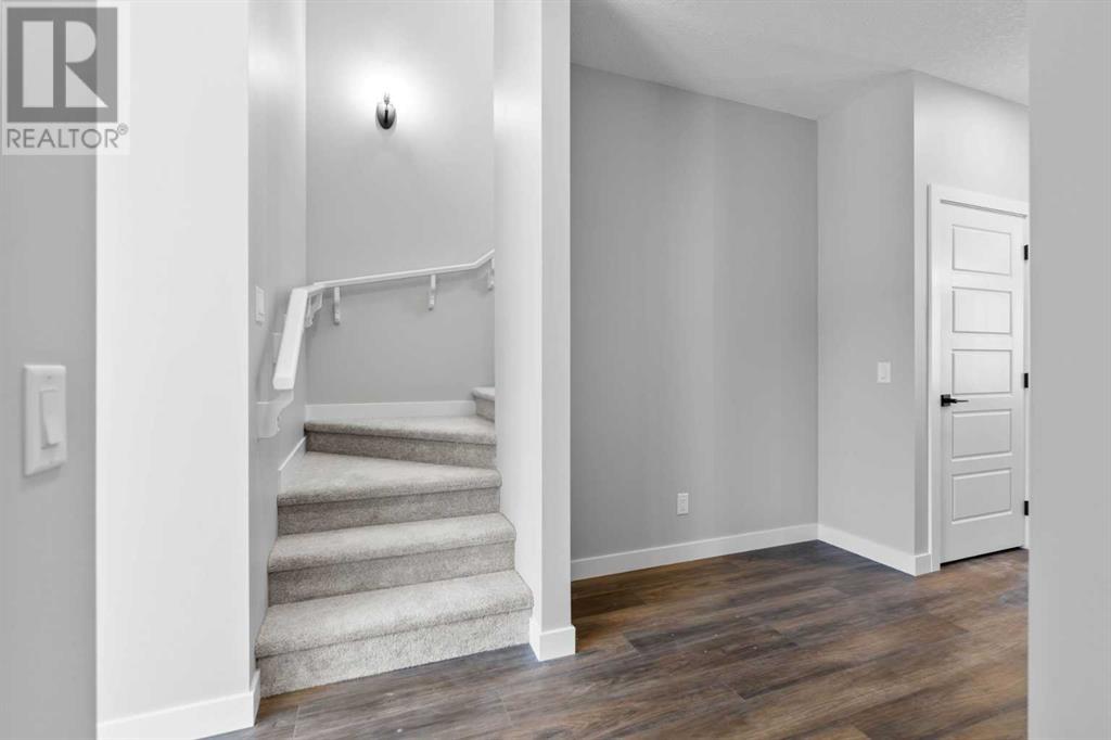65 Amblefield Heights Nw, Calgary, Alberta  T3P 2K1 - Photo 8 - A2217676