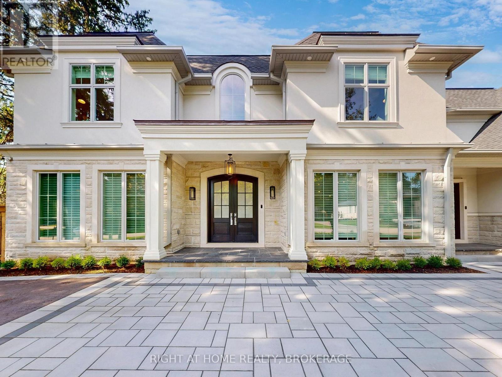 This Incredibly Keeren Designed Home Built In 2022! Located In Prestigious Eastlake Neighbourhood. This Home Boasts Approx.6300sf Luxury Living Space! Featuring Top-Notch Architectural Refinements With 4+1 Bdrms, 8 Baths (6 Full, 2 Half). Exterior Facade And Walk-up Area Built With Indiana Stone From The United States, Pella Windows And Doors, 71/2"*3/4 Grandeur White Oak Colour Engineered Hardwood Floor Through Out.The First Floor Boasts 10' Ceiling, A Double-Height Entry W/A Chandelier Lift/Down/W/A Skylight. Spacious Main Flr Office Perfect For Working From Home.  The Great Rm Area Includes A Cozy Gas Fireplace, Breathtaking Views Of the Stunning Backyard Pool. Kitchen Equipped With B/I High-end Wolf Gas Stove & Hood,  B/I Miele 30'' Fridge, Freezer, Oven & Micro, 2 B/I Asko Dishwashers And 24" Marvel Wine Fridge. A Lg 60* 91 Centre Island, Marble Calacatta Porceline Countertop And Backsplash, Ample Upper & Lower Cabinetry Space.The Interior Showcases Detailed Trim Work, Plaster Crown Molding, A Motorized Blinds System On Main Flr And Master Bdrm, Heated Floors In The Basement And All Ensuite Upstairs. Massive Windows Flooding Every Space With Light. The 2nd Floor Offers 4 Luxurious Bdrms, Each With Its Own Ensuite And W.I.C. Primary Bdrm W/A Lg Dress Rm W/A Skylight & Elegant 5pc Ensuite. The Residence Is Further Equipped With 2 Carrier Air Conditioning Units and 2 Furnaces W/Humidifiers. The Basement Includes A Guest Bdrm W/Ensuite, Rec, Home Theatre, Gym & Glass-enclosed Wine Rm.  Designed Landscaping At Front & Backyard. The Fully Fenced Rear Yard Is A True Oasis W/Salterwater Pool W/Waterfall, An Outdoor Covered Porch W/Stone Gas Fireplace & BBQ Area. Irrigation System, Security System W/HD Outdoor Cameras, An Indoor Sound System And Google Home Automation. Six Routers Allow Network Signal Transmitted Within Entire House. HWT Owned. Walking Distance To Town, Parks & The Lake. OT High School, Maple Grove, Ej James, St. Mildreds, Linbrook, Appleby, Maclachla (id:48254)