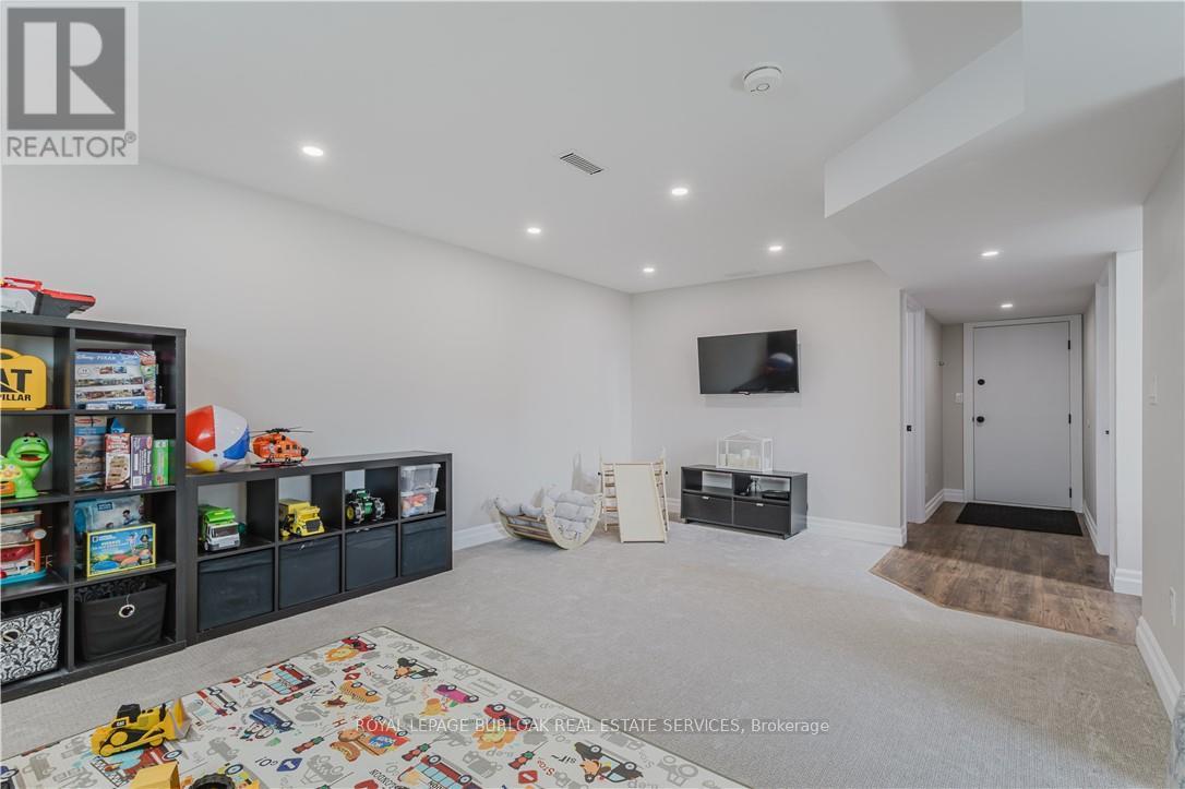 95 Eastbury Drive, Hamilton (Stoney Creek), Ontario  L8E 3G4 - Photo 21 - X12031362