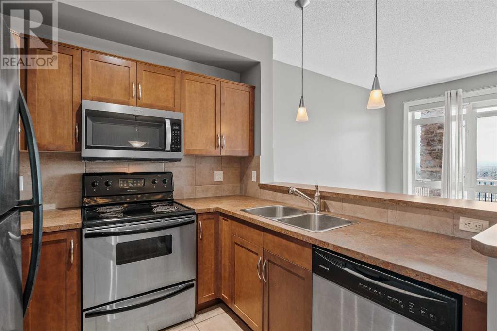 8, 153 Rockyledge View Nw, Calgary, Alberta  T3G 5Y5 - Photo 9 - A2215170