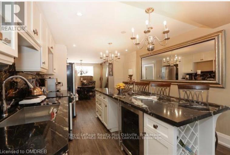 1 - 312 Reynolds Street, Oakville, Ontario  L6J 3L8 - Photo 10 - W12173298
