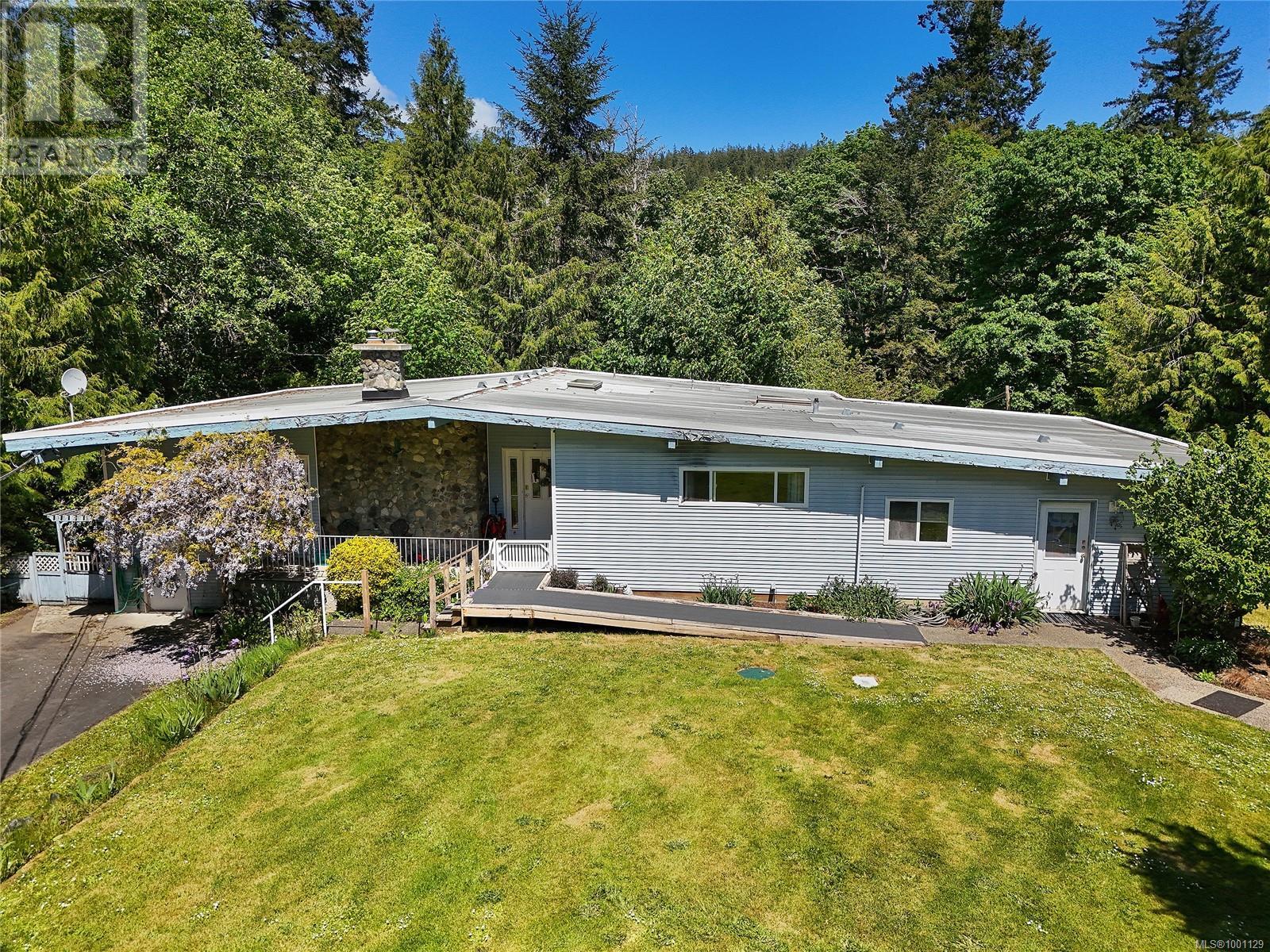 Property at 6790 Pascoe Rd image 1