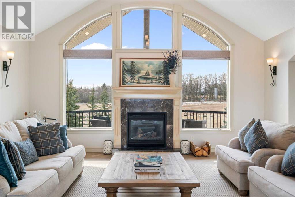 104 Grizzly Rise, Rural Rocky View County, Alberta  T4C 0B5 - Photo 6 - A2214464