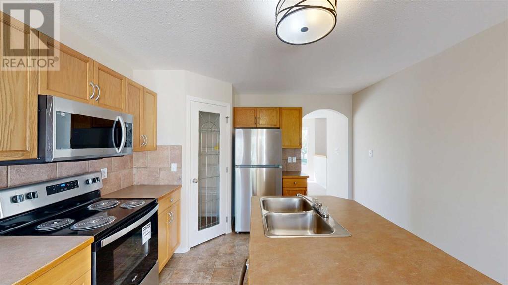Property at 170 Peigan Court W image 2
