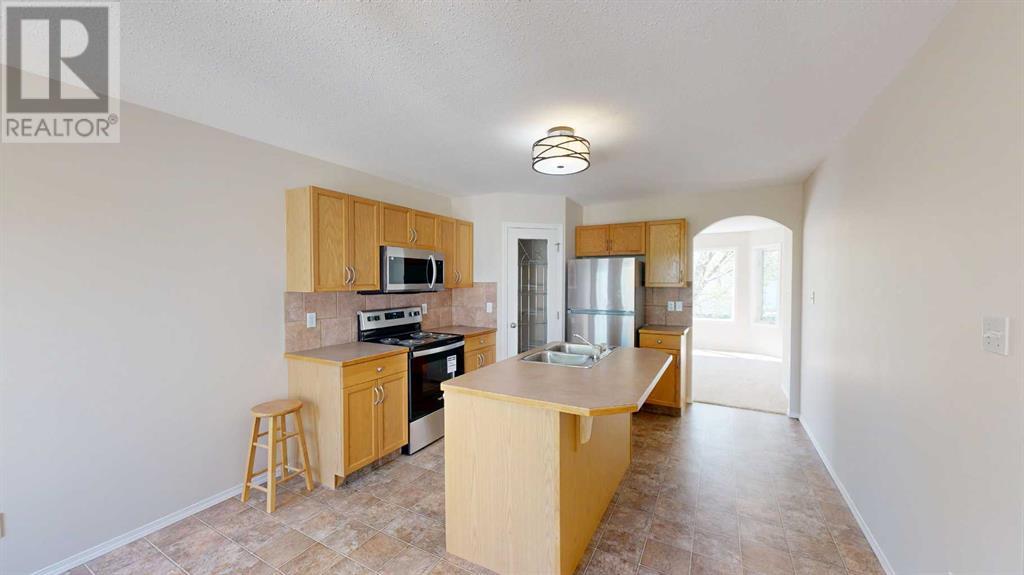 Property at 170 Peigan Court W image 1