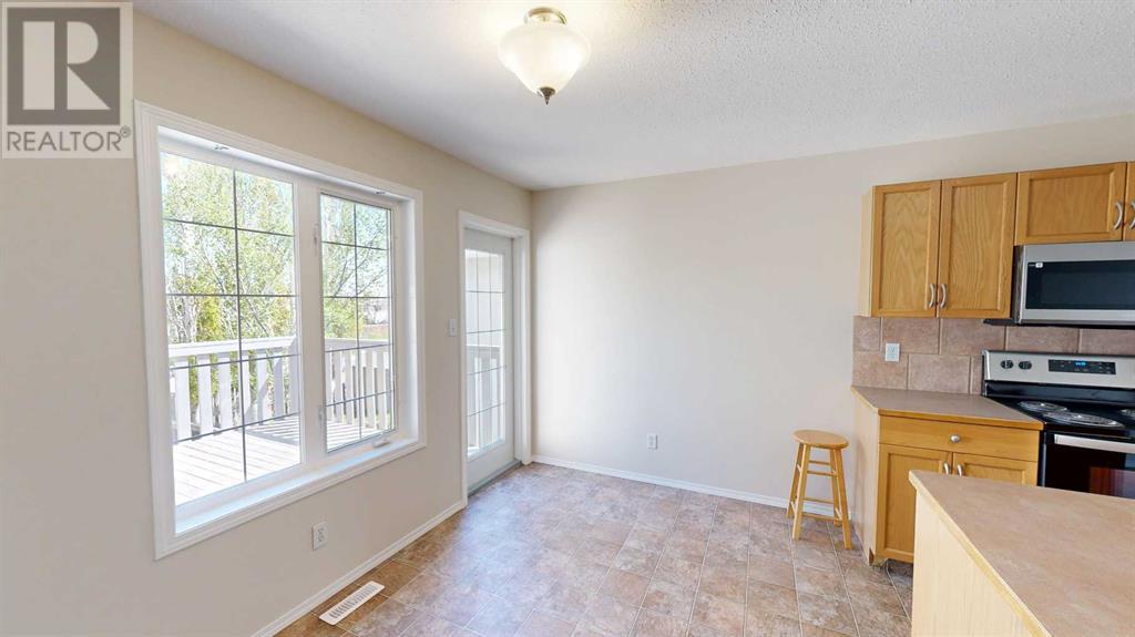 Property at 170 Peigan Court W image 4