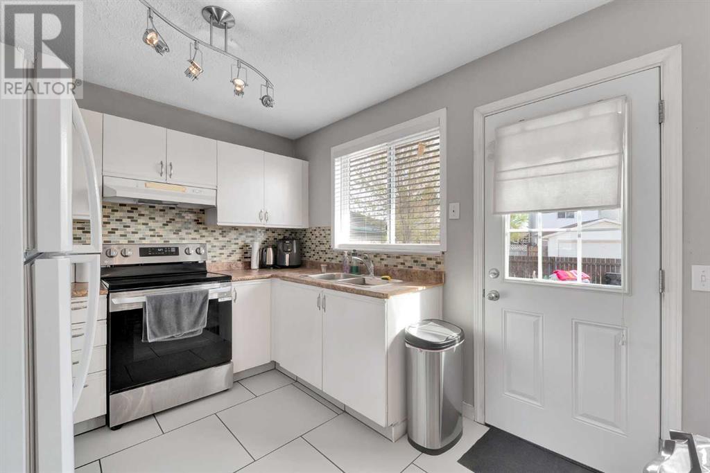 96 Martinbrook Road Ne, Calgary, Alberta  T3J 3E1 - Photo 8 - A2218641