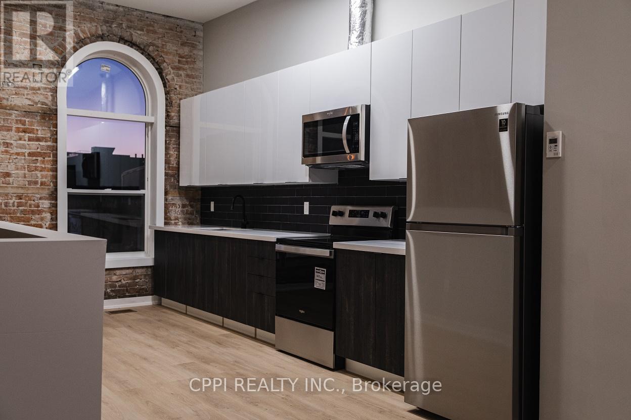 216 - 140 Simcoe Street, Peterborough Central, Ontario  K9H 2H5 - Photo 2 - X12050592