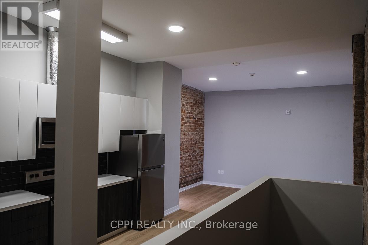 216 - 140 Simcoe Street, Peterborough Central, Ontario  K9H 2H5 - Photo 4 - X12050592