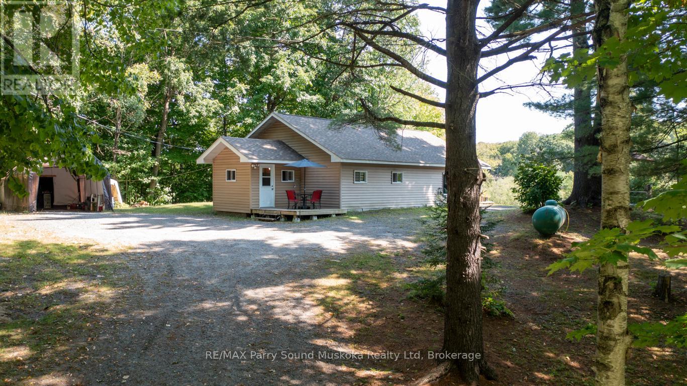 7 Blackstone Lake Road, Parry Sound, Ontario  P2A 2W8 - Photo 5 - X12117942