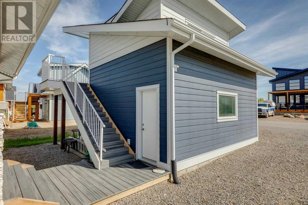 405 Cottageclub Cove, Rural Rocky View County, Alberta  T4C 1B1 - Photo 28 - A2214472