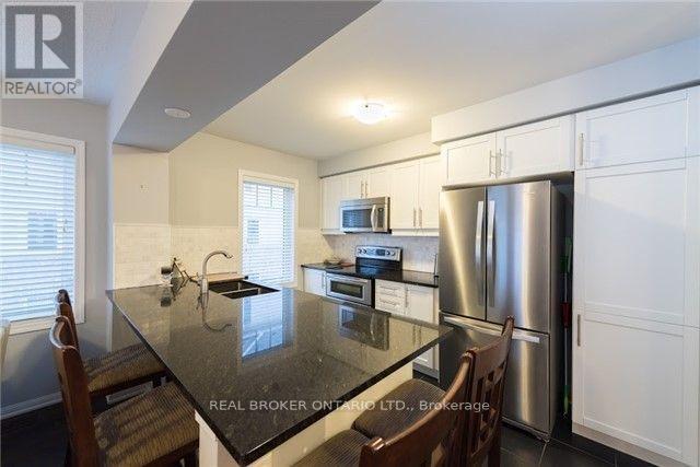 987 Nadalin Heights, Milton, Ontario  L9T 8R3 - Photo 6 - W12175364