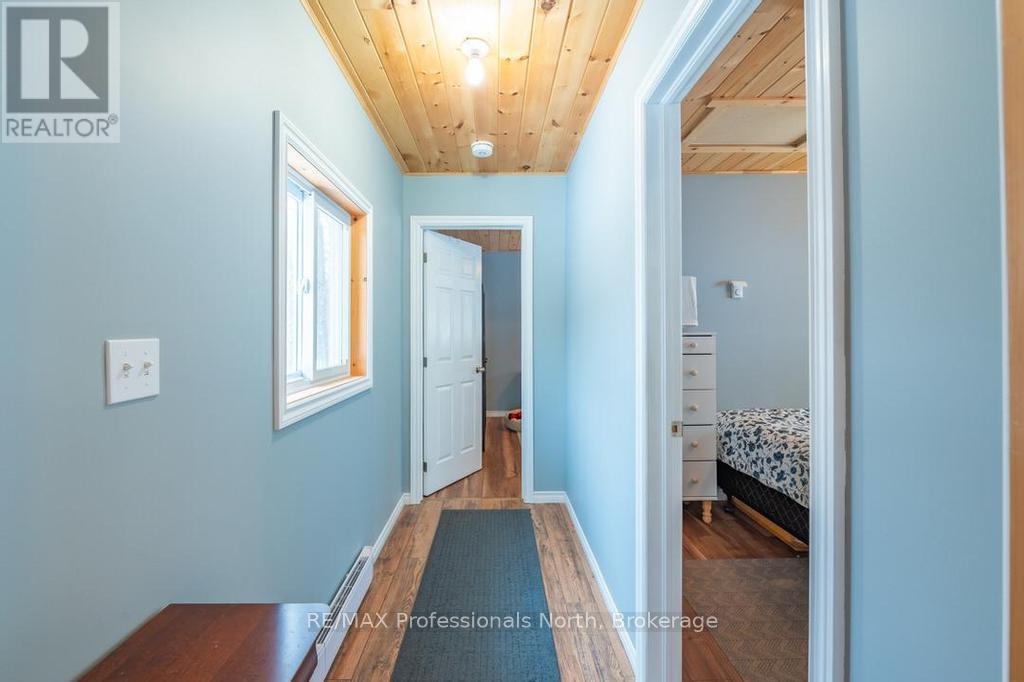 1145 Chelsea Lane, Algonquin Highlands, Ontario  K0M 1J1 - Photo 15 - X12175590
