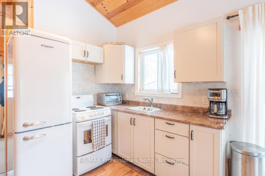 1145 Chelsea Lane, Algonquin Highlands, Ontario  K0M 1J1 - Photo 4 - X12175590