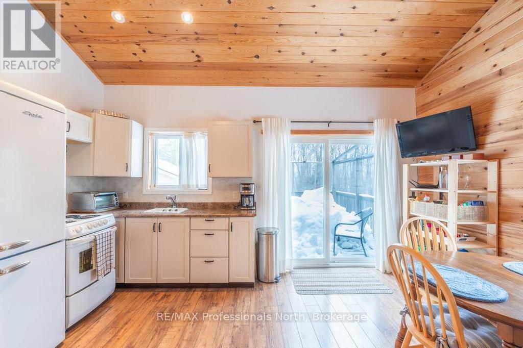 1145 Chelsea Lane, Algonquin Highlands, Ontario  K0M 1J1 - Photo 5 - X12175590
