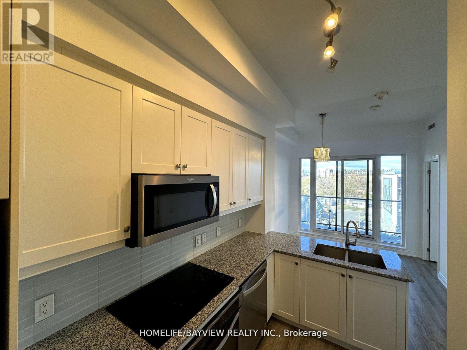 509 - 9618 Yonge Street, Richmond Hill, Ontario  L4C 0X5 - Photo 9 - N12175592