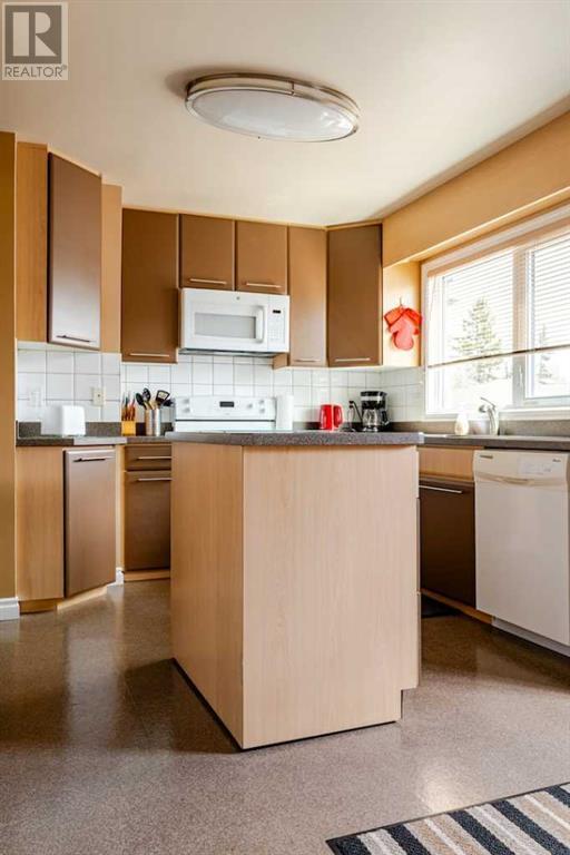 4116 Brisebois Drive Nw, Calgary, Alberta  T2L 2E7 - Photo 9 - A2208708