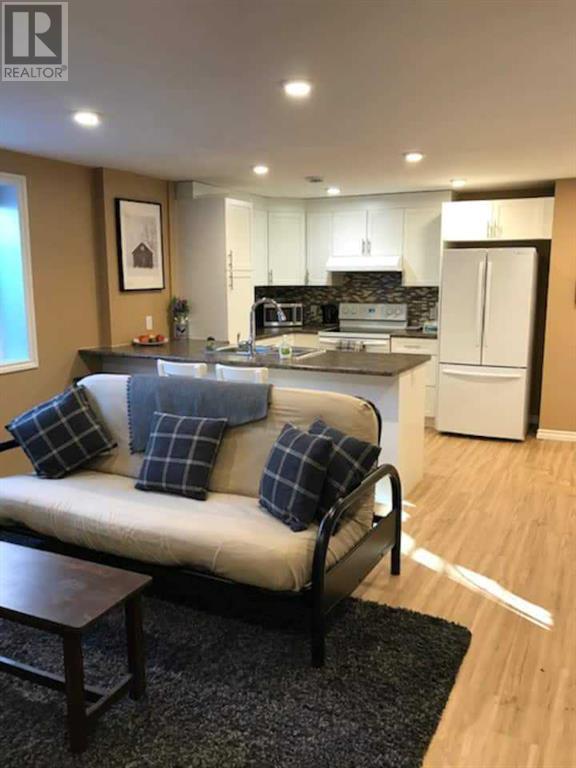 4116 Brisebois Drive Nw, Calgary, Alberta  T2L 2E7 - Photo 27 - A2208708