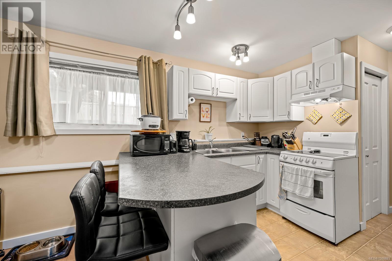 2623 Ulverston Ave, Cumberland, British Columbia  V0R 1S0 - Photo 22 - 1000693