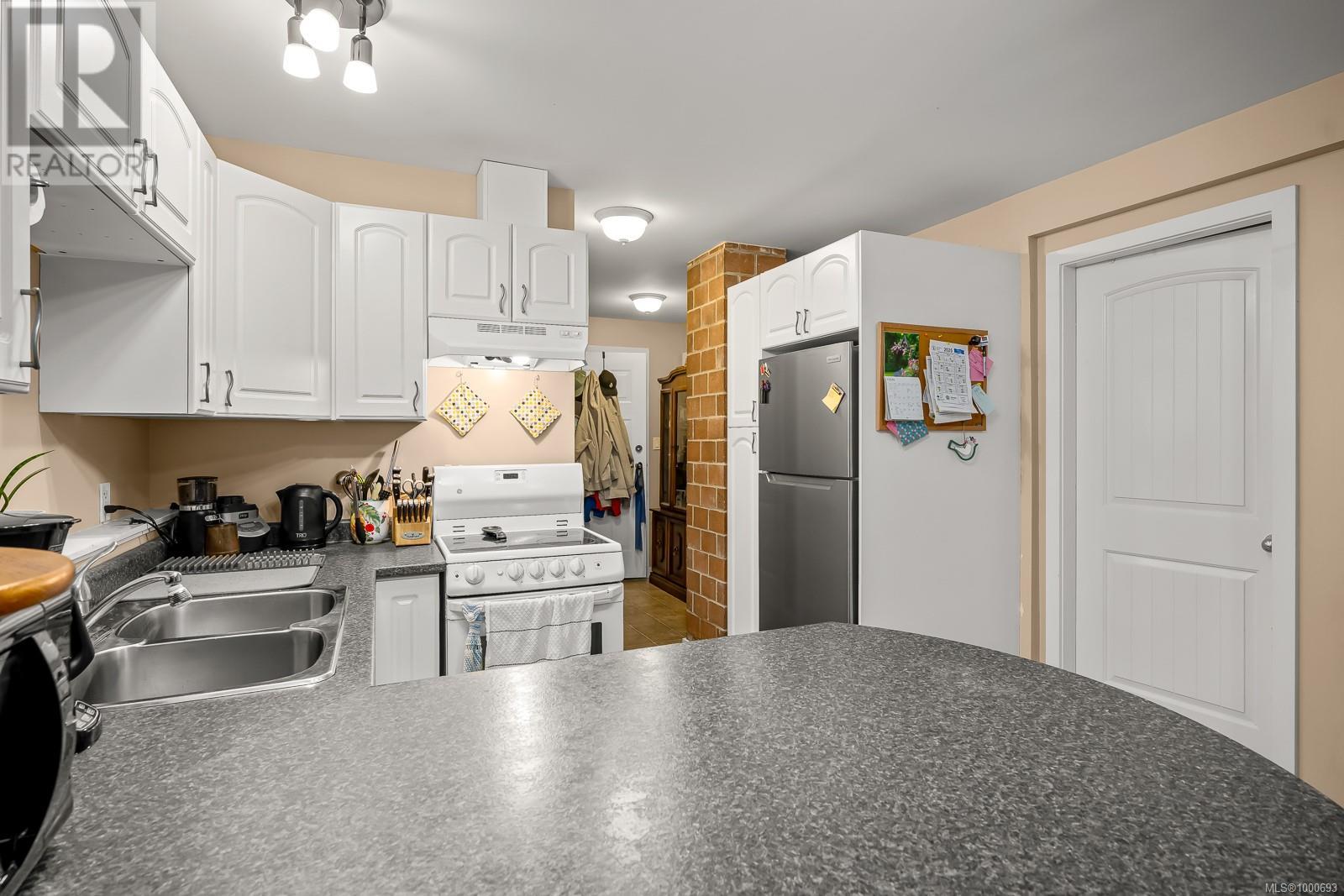 2623 Ulverston Ave, Cumberland, British Columbia  V0R 1S0 - Photo 24 - 1000693