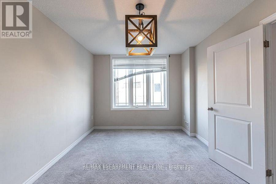 63 Crossings Way, Hamilton, Ontario  L0R 1P0 - Photo 3 - X12175852