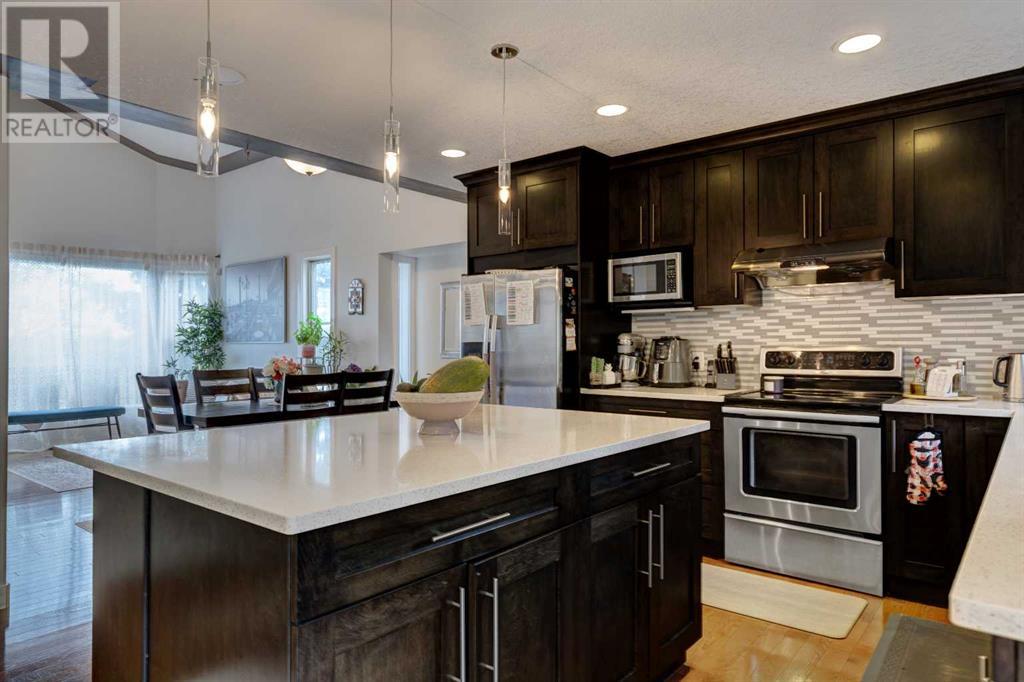 85 Sidon Crescent Sw, Calgary, Alberta  T2H 2C5 - Photo 8 - A2221916