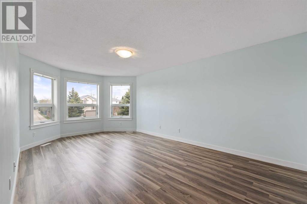 128 Harvest Hills Drive Ne, Calgary, Alberta  T3K 3X4 - Photo 4 - A2197889