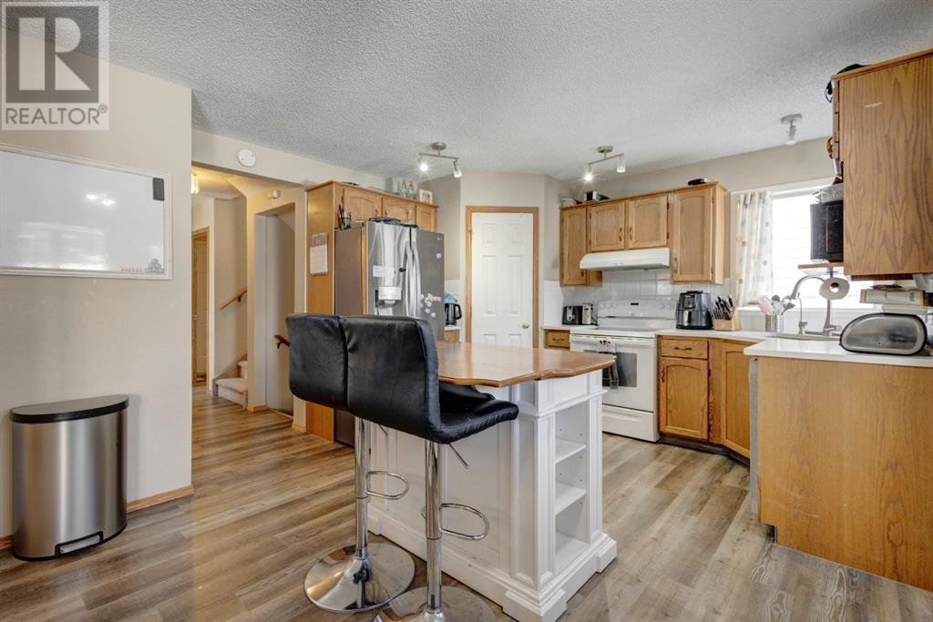 21 Hidden Ranch Circle Nw, Calgary, Alberta  T3A 5N8 - Photo 8 - A2211326