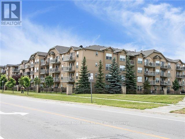 410 - 1480 Bishops Gate, Oakville, Ontario  L6M 4N4 - Photo 1 - W12176250
