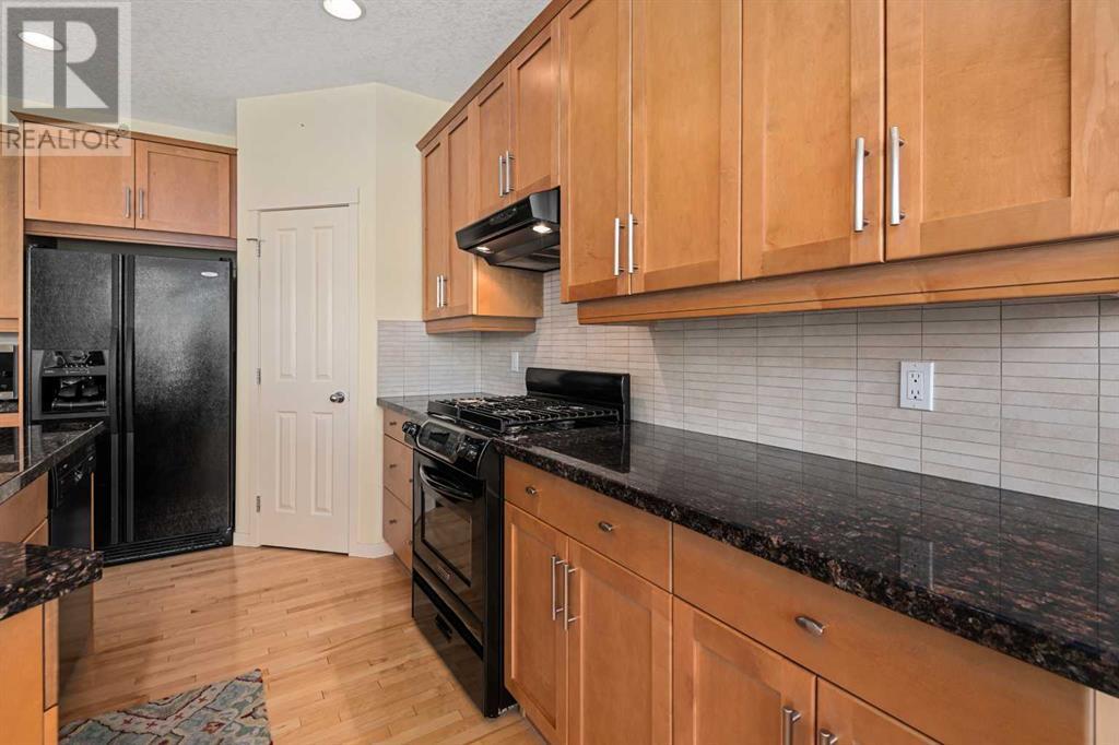 176 Cougarstone Court Sw, Calgary, Alberta  T3H 5R4 - Photo 10 - A2223230