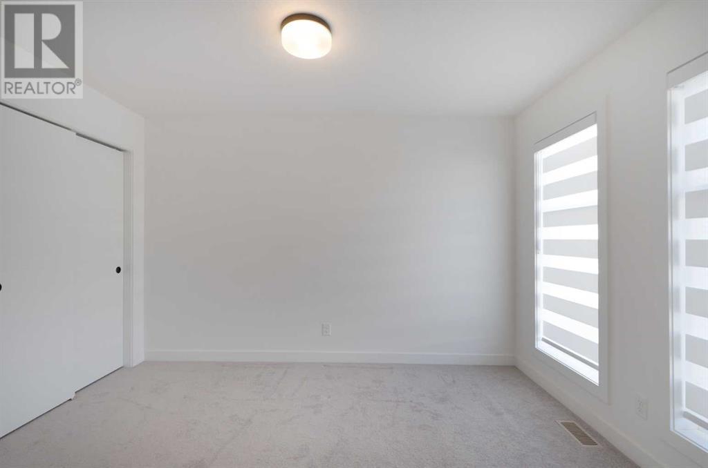 55 Spring Creek Common Sw, Calgary, Alberta  T3H 6E2 - Photo 32 - A2215758