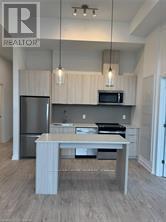 A 114 - 770 Whitlock Avenue, Milton, Ontario  L9E 2B2 - Photo 5 - W12177169