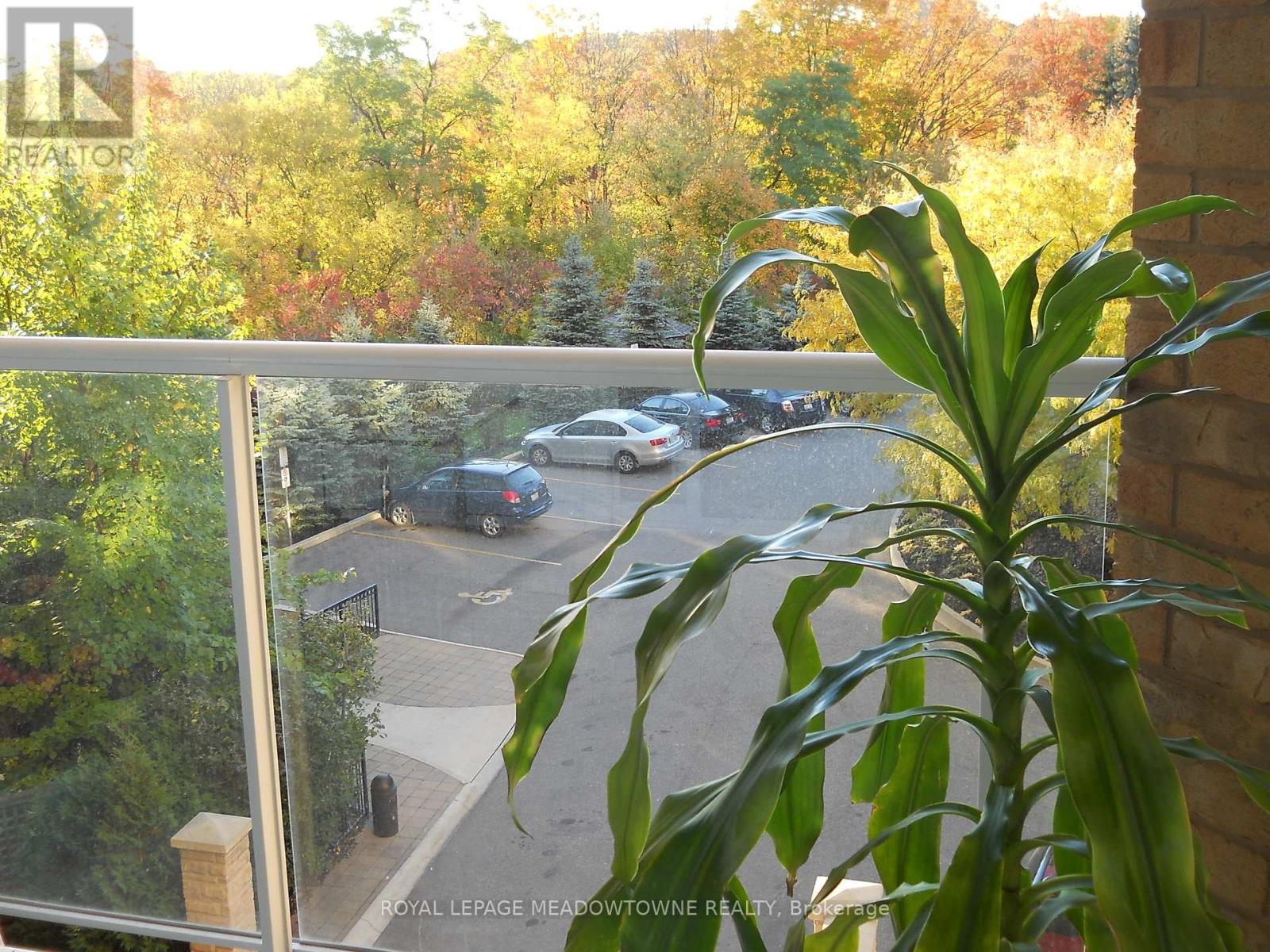 401 - 350 Mill Road, Toronto, Ontario  M9C 5R7 - Photo 2 - W12177244