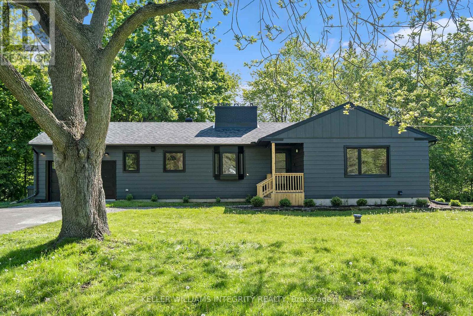 17 Lockview Road Ottawa, Ontario Experience exceptional waterfront living on just under 1.5 acres along the serene back channel of the Rideau River. This beautifully renovated home has been updated from top to bottom with high-end finishes and modern comforts throughout. Tucked away on a quiet, dead-end street, it offers the ultimate in privacy and tranquility. Enjoy a fabulous outdoor lifestyle with nearby access to Beryl Gaffney Park's scenic trails and natural beauty. A rare opportunity to own a turn-key oasis in one of Manoticks most peaceful and picturesque settings. Stunning updates throughout including all new windows, new doors, flooring, mechanical systems all packaged up in a beautiful package, right out of the pages of a magazine. Large kitchen perfect for gathering and hosting! You will love the new cooktop, stainless steel appliances, and functional kitchen island! Fabulous storage options and functionality in this beautiful, modern space. Primary bedroom with stylish finishes and a serene, modern aesthetic. Large windows frame stunning riverfront views, filling the space with natural light and a sense of tranquility. A chic cheater ensuite adds both convenience and luxury, blending design and function.The walk-out basement offers a cozy retreat with a charming electric fireplace, perfect for relaxing evenings and gazing out at the river. Flexible living spaces provide room for a home office, gym, or guest suite to suit your lifestyle. A full bathroom adds convenience and functionality to this inviting lower level. This home feels like a private spa retreat, featuring a luxurious barrel sauna and hot tub perfectly positioned to overlook the tranquil water. It's the ideal setting to unwind, recharge, and enjoy peaceful waterfront views year-round. 24 hours irrevocable on all offers as per form 244. (id:48254)