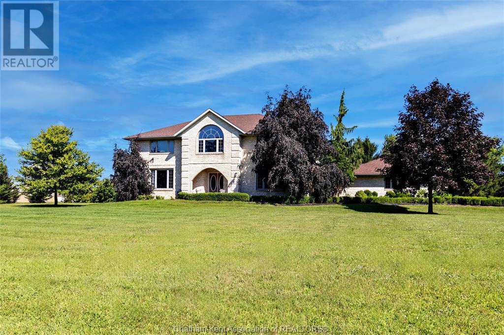 Welcome to this stunning custom-built home with 4,200 sqft (PLUS full Basement) on a 2.64-acre lot featuring an I/G Pool and Pond complete with fish! Just 2 minutes from downtown Thamesville and 15 minutes to Chatham this home offers 5 Bedrooms, a Home Office, 4.5 Bathrooms, spacious living areas and 2-car attached Garage. The main floor boasts a remodelled Mylen Kitchen (2021) with centre island and new Frigidaire Professional stainless steel appliances (2022), Formal Dining room, sunken Living room with gas FP, Home Office, Family room, Mudroom, and 2pc Powder room. Upstairs is the Primary Bedroom with double closets and ""His-and-Hers"" ensuite Baths, 4 additional Bedrooms sharing 2 more full Baths, a Laundry room and cozy Sitting Area with large picture window. The Basement includes a Rec Room, direct garage access, ample storage and potential for even more living space.  Other updates include Shingles (2022), Furnace (2022), Pool Liner (2020) and Pool Filter (2023). BBQ is included. (id:48254)