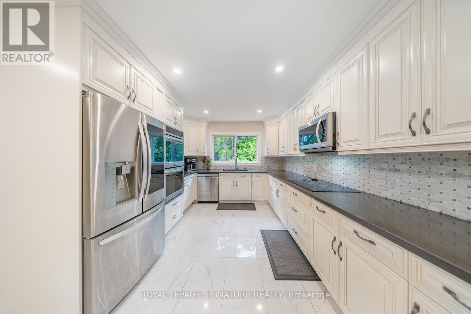 63 Collingdale Road, Toronto (Mount Olive-Silverstone-Jamestown), Ontario  M9V 3R2 - Photo 13 - W12178494
