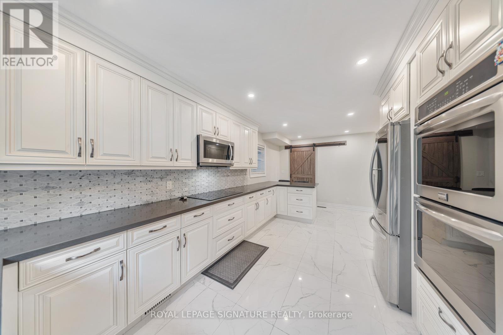 63 Collingdale Road, Toronto (Mount Olive-Silverstone-Jamestown), Ontario  M9V 3R2 - Photo 16 - W12178494