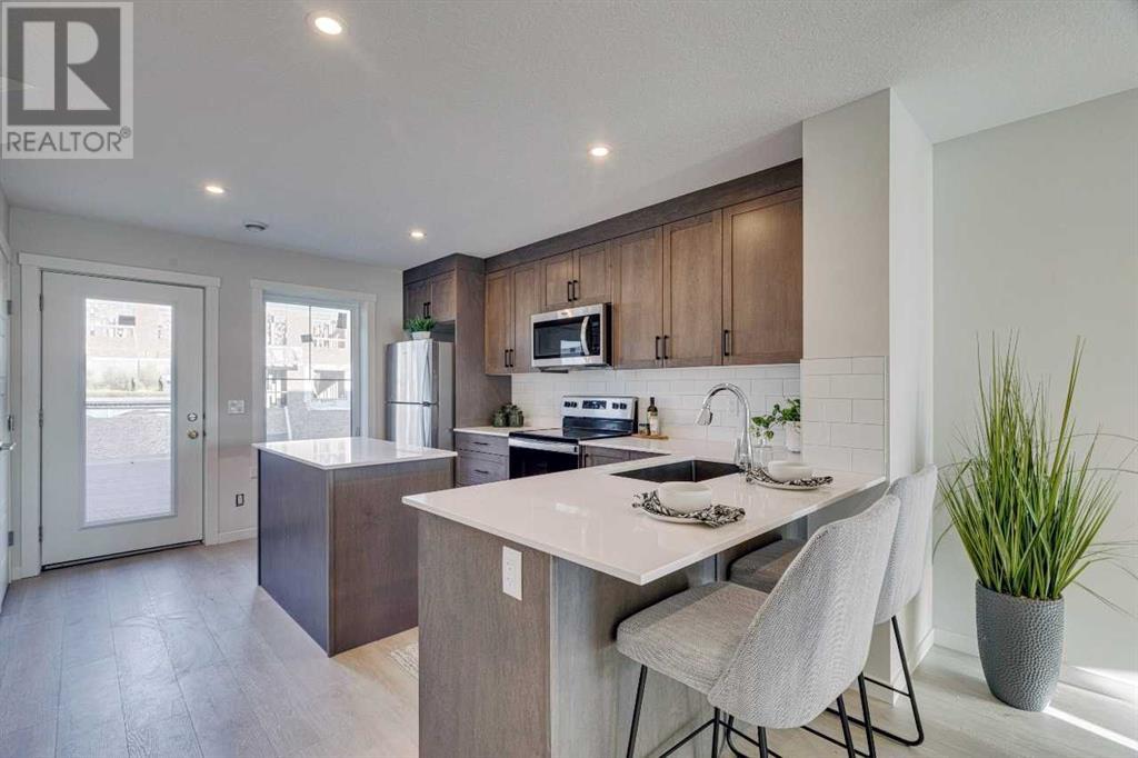 819, 155 Crimson Ridge Place Nw, Calgary, Alberta  T3L 2M4 - Photo 3 - A2193948