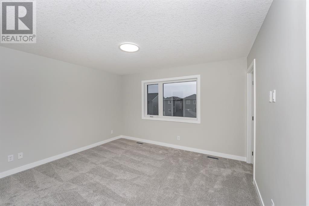 936 Reynolds Lane Sw, Airdrie, Alberta  T4B 5L7 - Photo 25 - A2220497