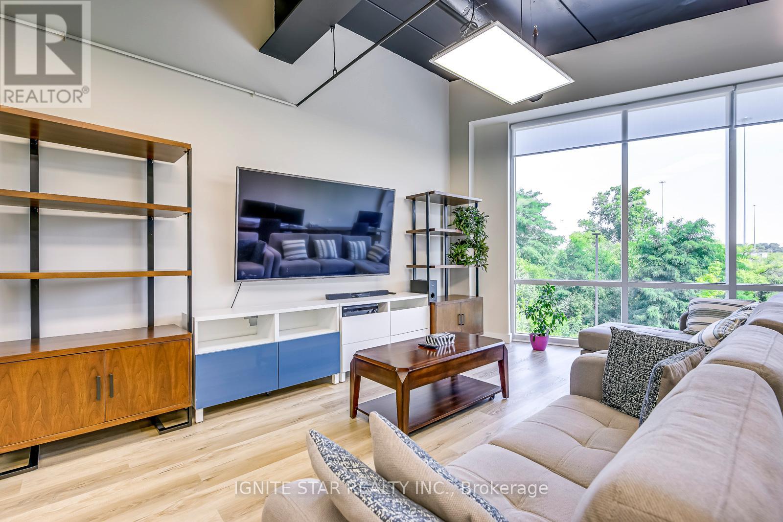 208 - 1670 North Service Road E, Oakville (Qe Queen Elizabeth), Ontario  L6H 7G3 - Photo 2 - W12178963