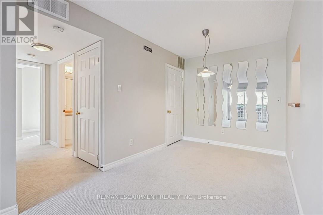 1102 - 4140 Foxwood Drive, Burlington, Ontario  L7M 4R4 - Photo 4 - W12179040