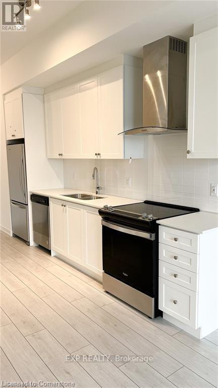 208 - 55 Duke Street W, Kitchener, Ontario  N2H 0C9 - Photo 3 - X12179252