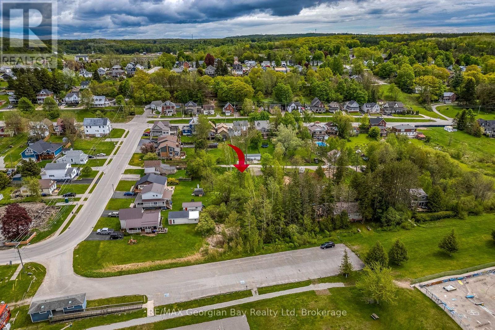 63 Nettleton Drive, Penetanguishene, Ontario  L9M 1N1 - Photo 4 - S12179426