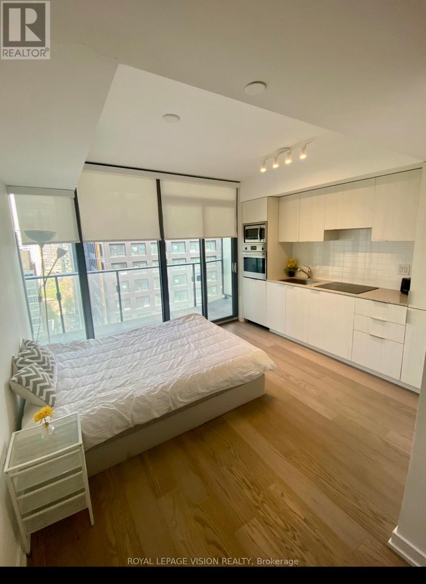 1710 - 11 Wellesley Street W, Toronto, Ontario  M4Y 1E8 - Photo 1 - C12180149