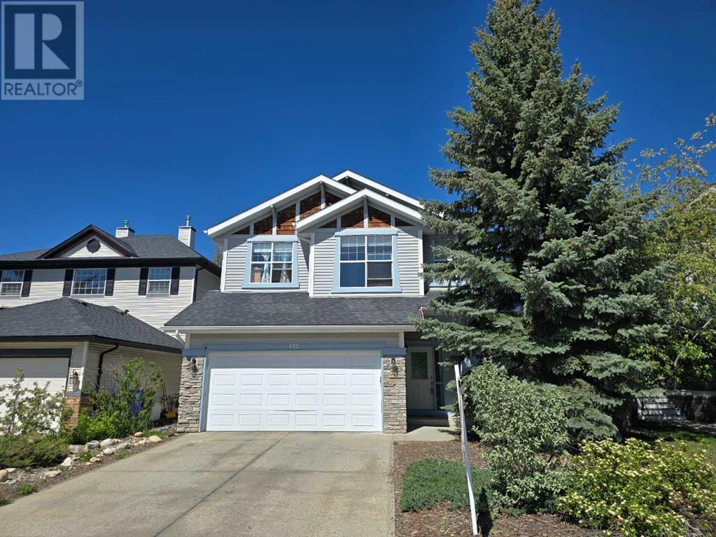 Property at 132 Cougar Ridge Drive SW image 1