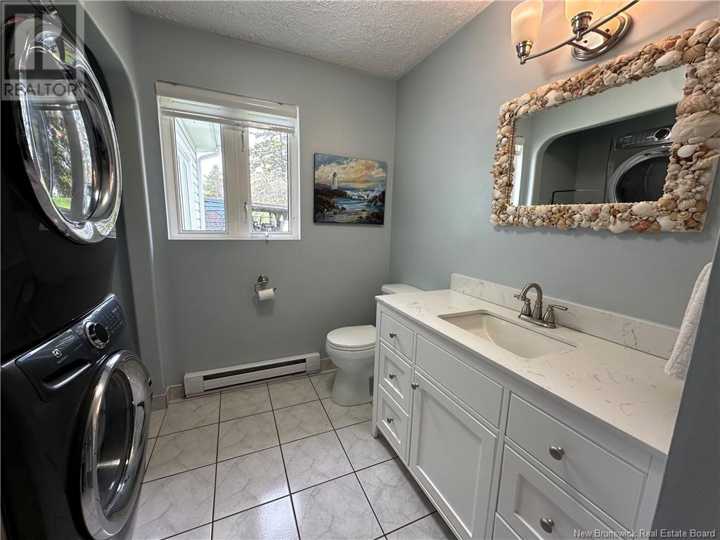 9 Rue Des Cedres, Nigadoo, New Brunswick  E8K 3T8 - Photo 34 - NB117800