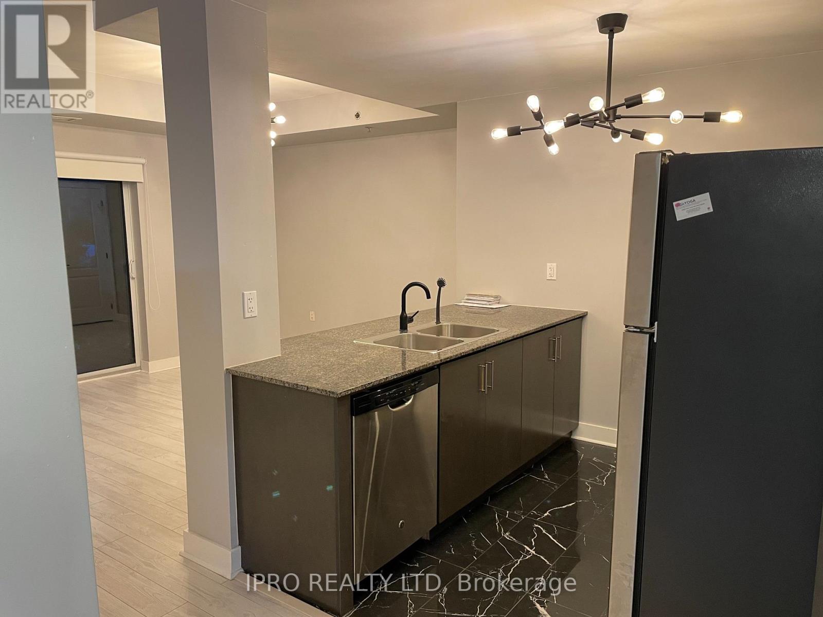 102 - 1419 Costigan Road, Milton, Ontario  L9T 2L4 - Photo 5 - W12174711
