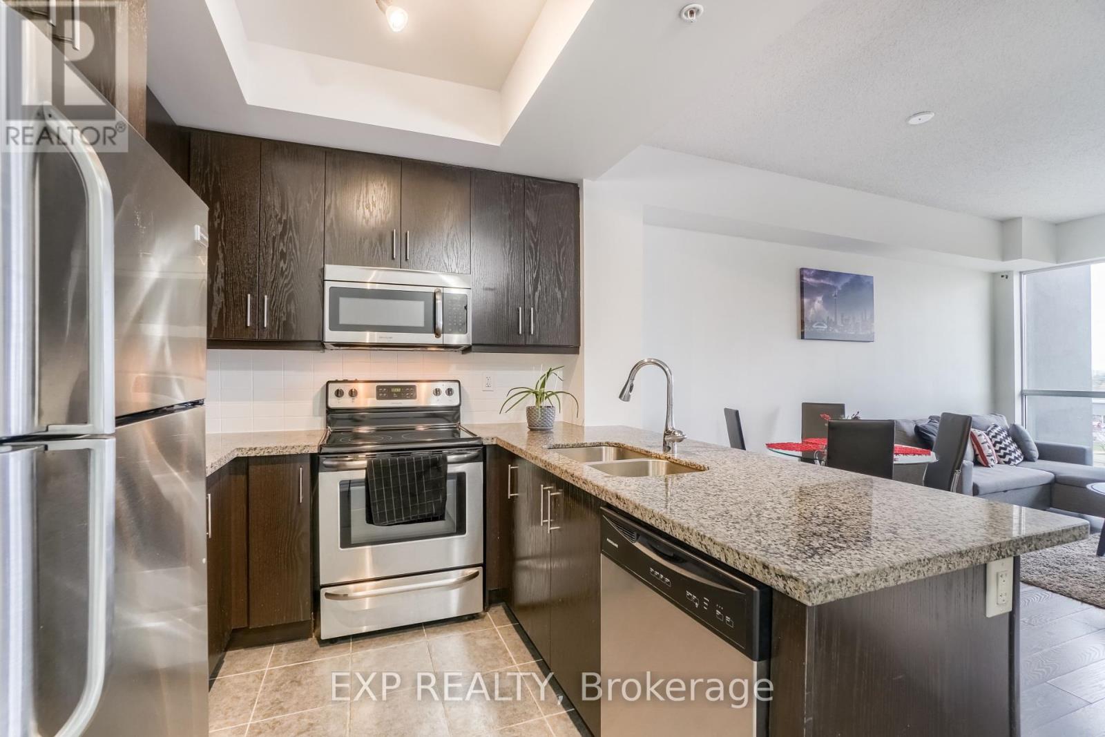 708 - 15 James Finlay Way, Toronto, Ontario  M3M 0B3 - Photo 6 - W12180836