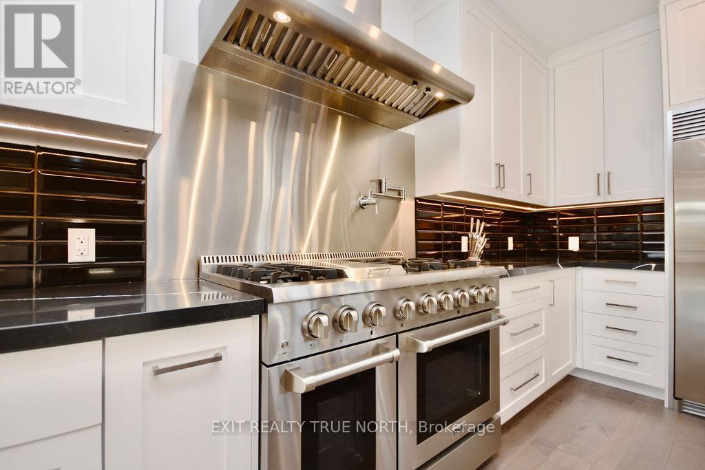57 Glenhuron Drive, Springwater, Ontario  L4M 6T4 - Photo 17 - S12181041