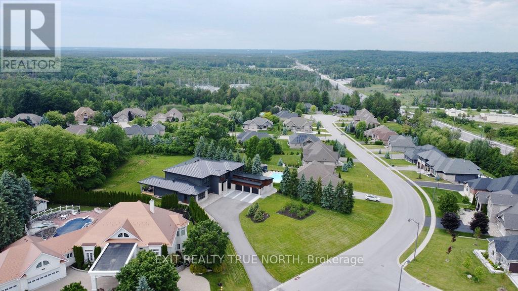 57 Glenhuron Drive, Springwater, Ontario  L4M 6T4 - Photo 50 - S12181041
